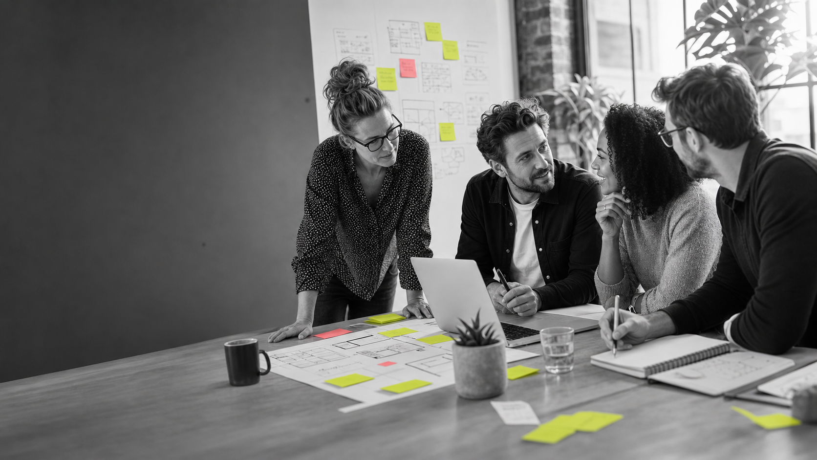 A team working through a plan together